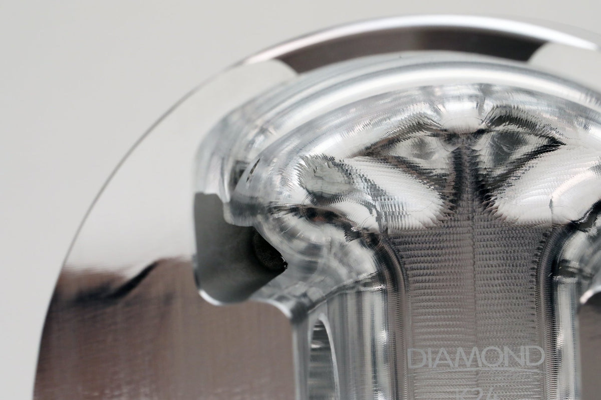 Diamond Honda K20 Rebel representative series photograph: undercrown machining close-up. Exact crown and dimensions depend on kit SKU.