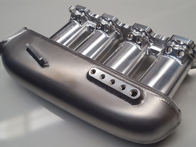 Plazmaman 4G63 Evo 4 through 9 billet intake manifold; eight injector configuration and finish shown as examples