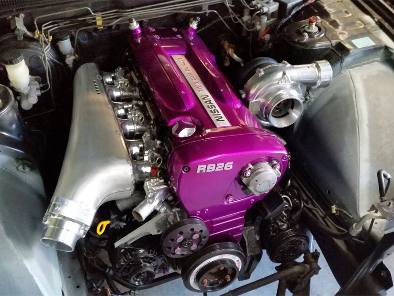 RB26 GT-R single throttle conversion inlet plenum; photographed finish and hardware vary