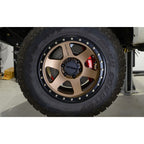 Harrop Ford Ranger front brake upgrade behind off-road wheel
