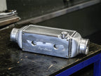 Plazmaman 500 hp compact water-to-air intercooler; shown fittings and finish vary