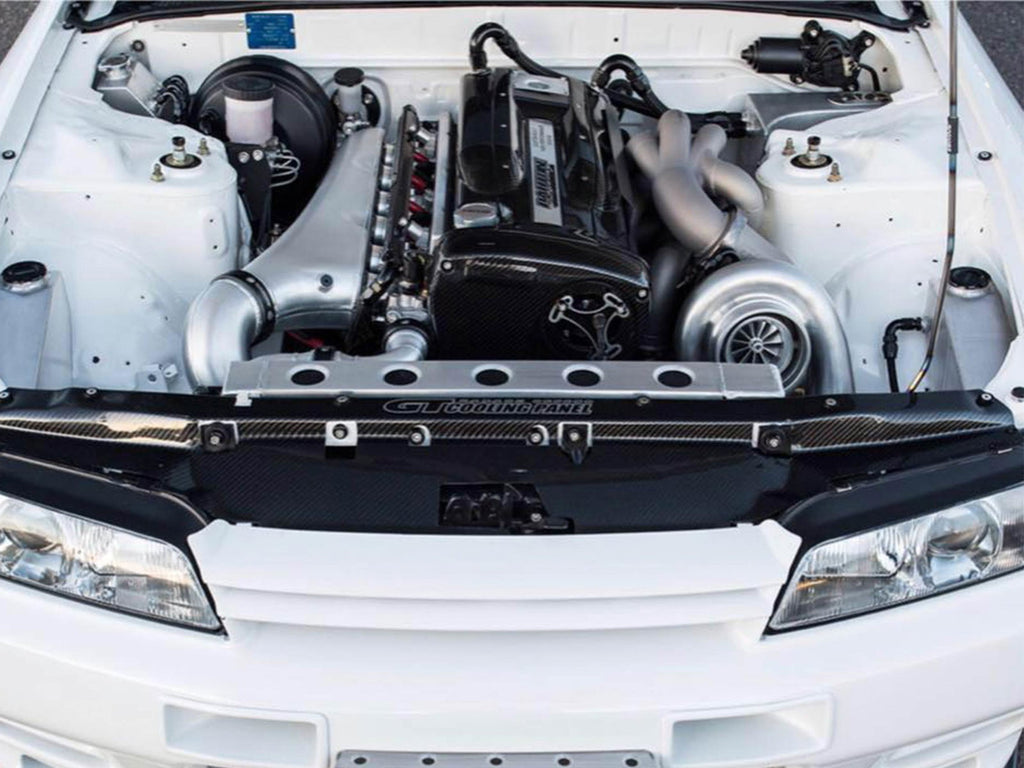 RB26 GT-R individual throttle body inlet plenum using the factory six throttles; photographed finish and equipment vary