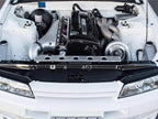 RB26 GT-R individual throttle body inlet plenum using the factory six throttles; photographed finish and equipment vary